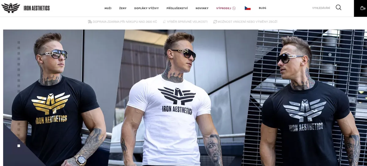 Úvodní stránka e-shopu Iron Aesthetics s modely v černém a bílém tričku s logem