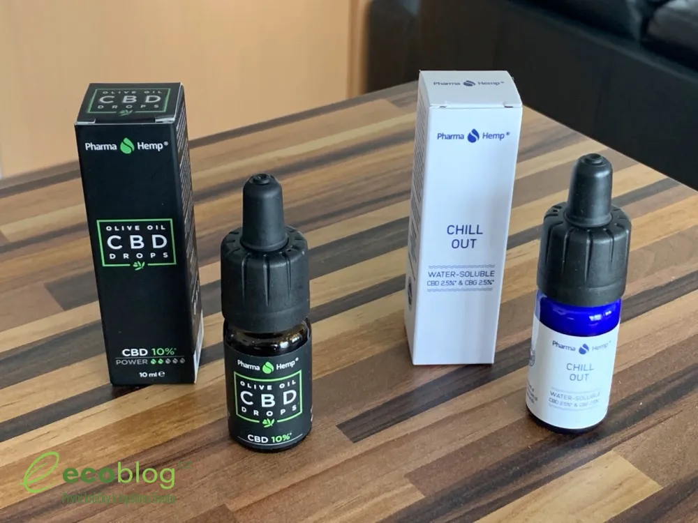 CBD oleje Pharma Hemp rozložené na stole